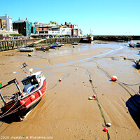 Buy canvas prints of Harbour and quay during low tide at Bridlington in Yorkshire. by john hill