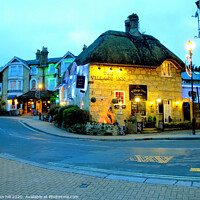 Buy canvas prints of Dusk at Shanklin old Village on the Isle of Wight.  by john hill