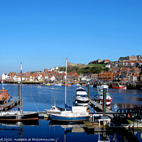 Buy canvas prints of The harbour in November at Whitby in Yorkshire. by john hill