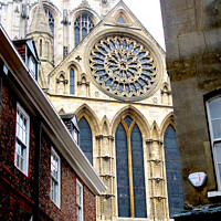 Buy canvas prints of York Minster rose window and tower at York in Yorkshire. by john hill