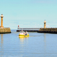 Buy canvas prints of The Twin Piers at Whitby in Yorkshire. by john hill