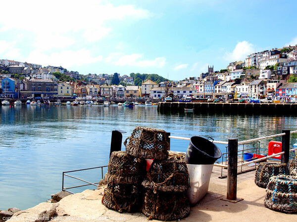 A tranquil  morning harbour at Brixham in Devon. Picture Board by john hill