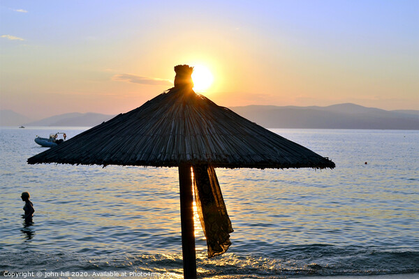 Sunset at Ag Eleni beach on Skiathos in Greece. Picture Board by john hill