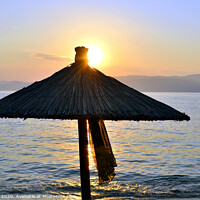 Buy canvas prints of Sunset at Ag Eleni beach on Skiathos in Greece. by john hill