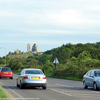 Buy canvas prints of Corfe Castle as seen from the road. by john hill
