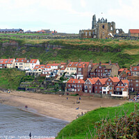 Buy canvas prints of Old Whitby town beach and church in North Yorkshire. by john hill