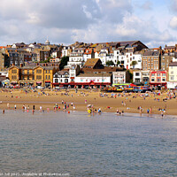 Buy canvas prints of Scarborough seafront from the pier in August. by john hill