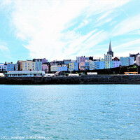 Buy canvas prints of Colorful Tenby from the sea in South Wales, UK. by john hill