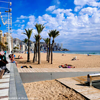 Buy canvas prints of Levante beach at Benidorm in Spain. by john hill