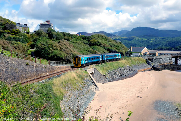 Coastal train at Barmouth in Wales. Picture Board by john hill