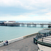 Buy canvas prints of Cromer pier and lifeboat station. by john hill