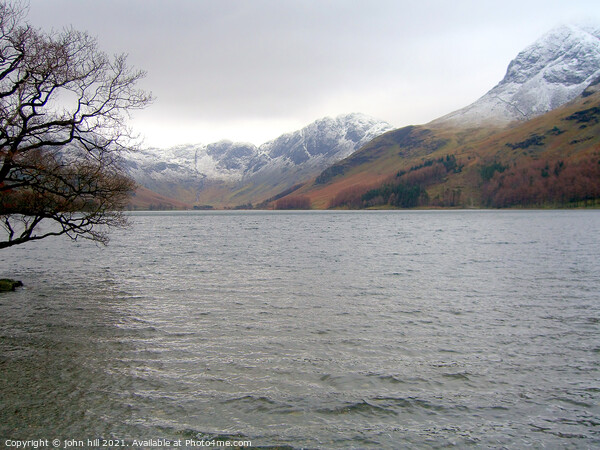 Buttermere Lake and haystack in the lake district Picture Board by john hill