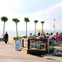 Buy canvas prints of Seafront Alfresco at Bournemouth. by john hill