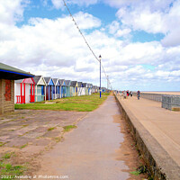 Buy canvas prints of Promenade and beach huts. by john hill