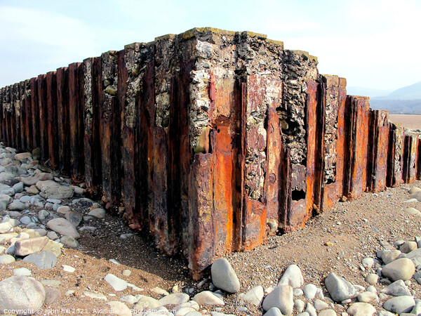 Iron Sea Defences in Wales. Picture Board by john hill