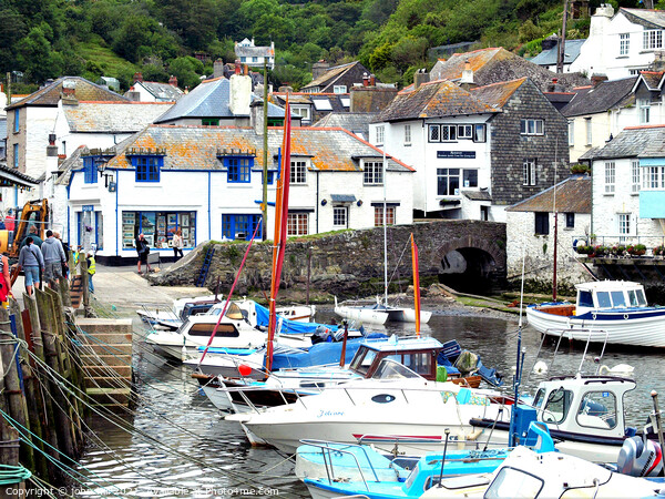 Harbour and town at Polperro in Cornwall. Picture Board by john hill
