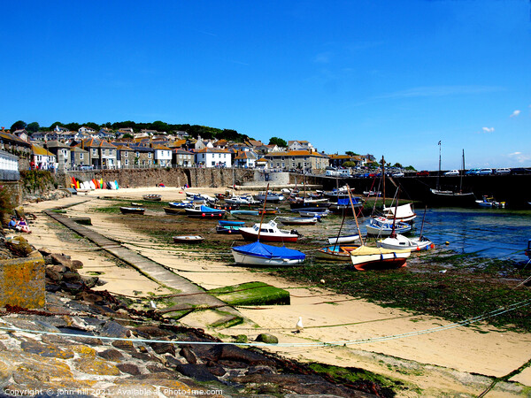 Mousehole harbour in Cornwall. Picture Board by john hill