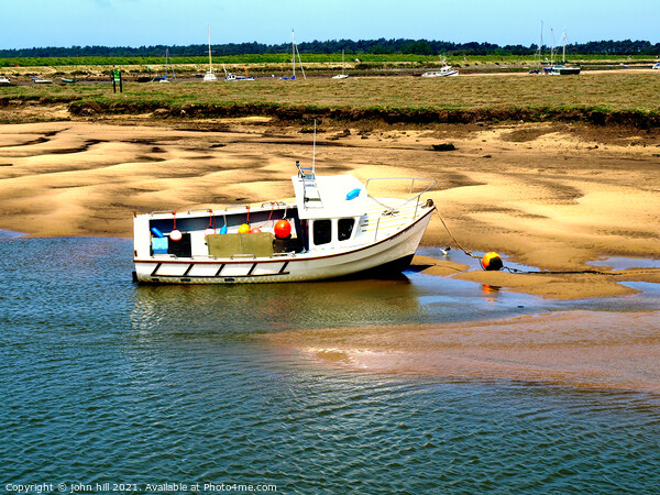 Beached at Wells Next The Sea in Norfolk. Picture Board by john hill