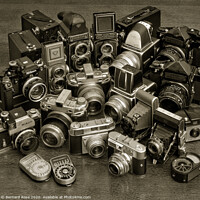 Buy canvas prints of Collection of Film Cameras with sepia tint by Bernard Rose Photography