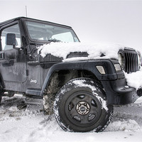 Buy canvas prints of Jeep in the Snow by Eddie Howland