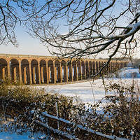 Buy canvas prints of Balcombe Viaduct in the Snow at sunset by Eddie Howland