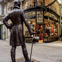 Buy canvas prints of Beau Brummell Monument and Picadilly Arcade in London by Karol Kozlowski