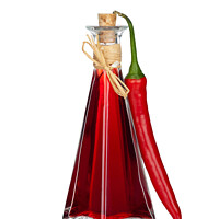Buy canvas prints of Bottle Chili Oil and Chili Pepper with real reflection by Thomas Klee