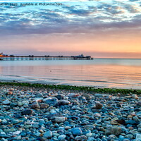 Buy canvas prints of Dawn on LLandudno Beach and pier by Helkoryo Photography
