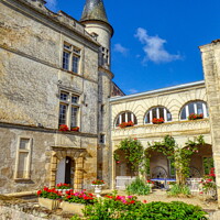 Buy canvas prints of The Château Lagorce France Courtyard by Helkoryo Photography