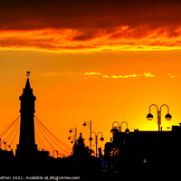 Buy canvas prints of Majestic Sunset over Skegness Clock Tower by Helkoryo Photography