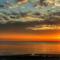 Buy canvas prints of Dark warm Sunrise Llandudno beach  by Helkoryo Photography