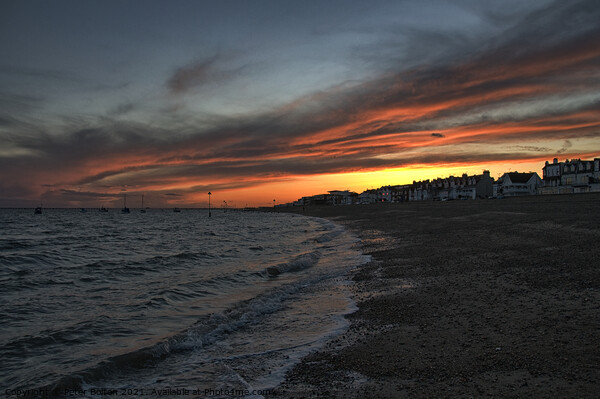 Sunset over the coast at Thorpe Bay, Essex. Picture Board by Peter Bolton