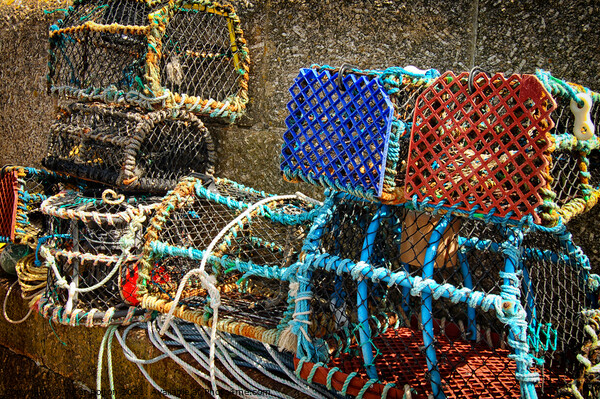 Lobster pots on a jetty at St. Ives, Cornwall, UK. Picture Board by Peter Bolton