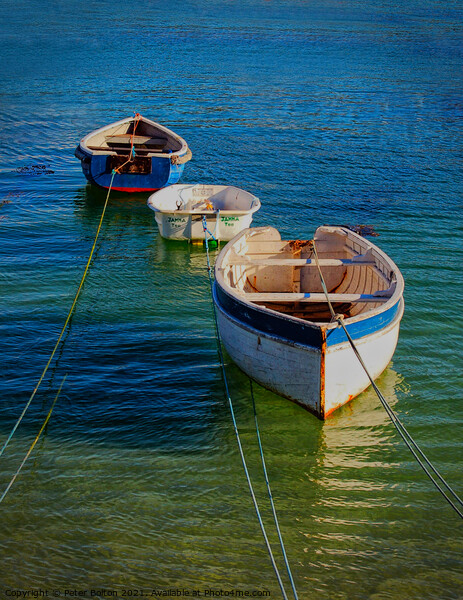Small dinghies at moorings in St. Ives harbour, Co Picture Board by Peter Bolton