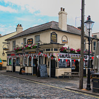 Buy canvas prints of A Historic Pub with Picturesque Views by Peter Bolton