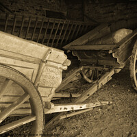 Buy canvas prints of Victorian farm carts in a barn at Coggeshall, a village in Essex, UK by Peter Bolton