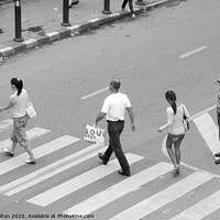 Buy canvas prints of People on a pedestrian crossing in Bangkok. by Peter Bolton