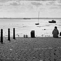 Buy canvas prints of Sitting on the edge of the dock taking in the view. Old Leigh, Essex, UK. by Peter Bolton