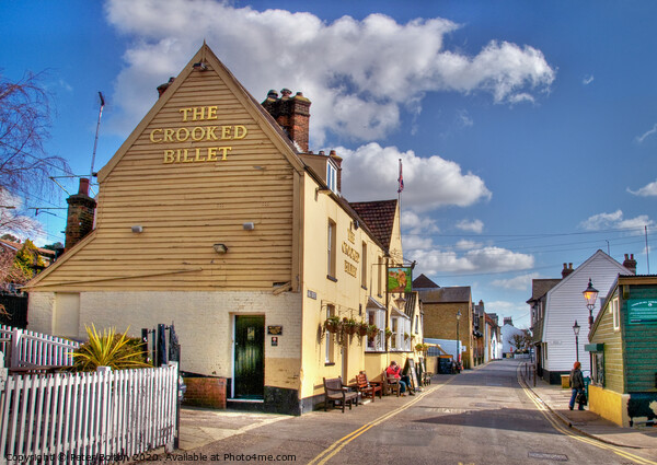 'The Crooked Billet' pub and High Street, Old Leigh, Essex, UK. Picture Board by Peter Bolton