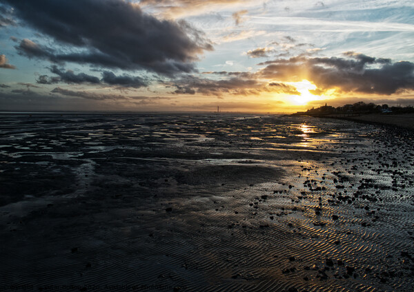 East Beach at sunset, Shoeburyness, Essex, UK. Picture Board by Peter Bolton