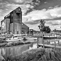 Buy canvas prints of Old mill at Battlesbridge, now an antiques centre, River Crouch in foreground. by Peter Bolton