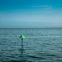 Buy canvas prints of Minimal seascape of The Thames Estuary with a marker cone as the point of interest. by Peter Bolton