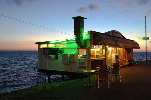 Seafront cafe in the evening at Westcliff on Sea, Essex, UK Picture Board by Peter Bolton
