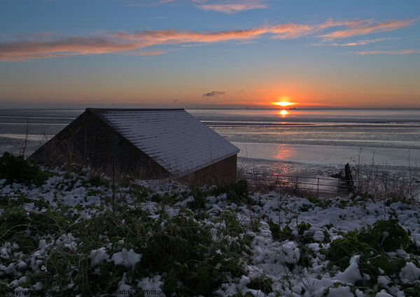 Winter sunrise at the old Boat Shed, Shoeburyness Garrison, Essex, UK. Picture Board by Peter Bolton