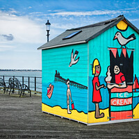Buy canvas prints of A beach hut display on the pier at Southend on Sea, Essex, Uk. by Peter Bolton