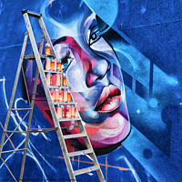 Buy canvas prints of Artwork by a street artist with a stepladder and spray cans arranged on the steps ready for use. by Peter Bolton