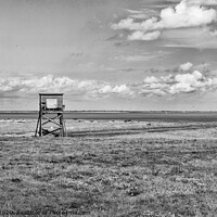 Buy canvas prints of Black and white landscape of coastal nature reserve with an observation hide. At Bradwell, Essex. by Peter Bolton