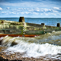 Buy canvas prints of Waves crashing over a breakwater on the beach at Westcliff on Sea, Essex, UK by Peter Bolton