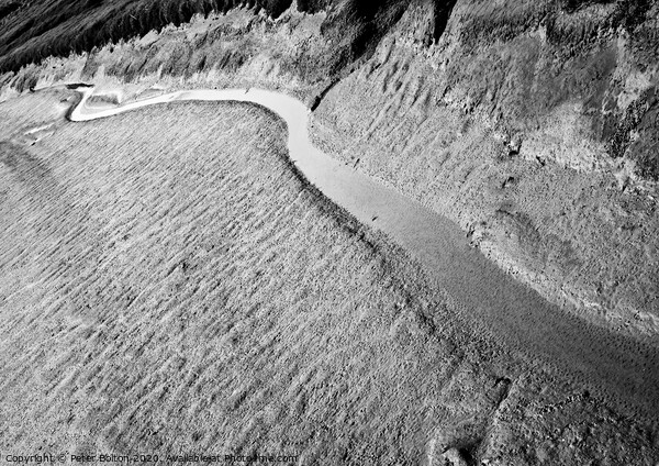 A black and white 'abstract in nature' of a natural tidal drainage channel through the dunes. Picture Board by Peter Bolton