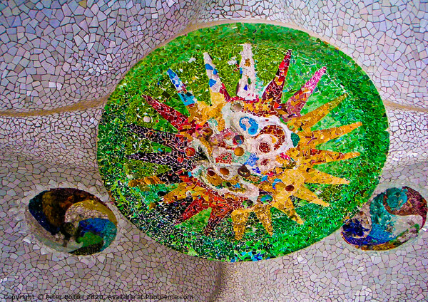 Mosaic in a ceiling by Antoni Gaudi at Park Guell public park in Barcelona. Picture Board by Peter Bolton